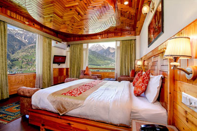 Super Deluxe Cottage bedroom view — Foghills Manali